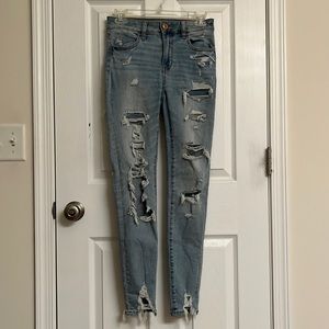 American Eagle Next Level Stretch Ripped Lt Wash Blue Cotton-blend Jeans Size 2